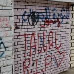 This graffiti honors the story of Tallal, an eight-year-old kid who was murdered when he refused to give up his bike.